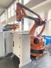 Utilizzato KUKA KR240 Industrial Customized Pallet Robot con PLC Core Components e DeviceNet Communication Protocol